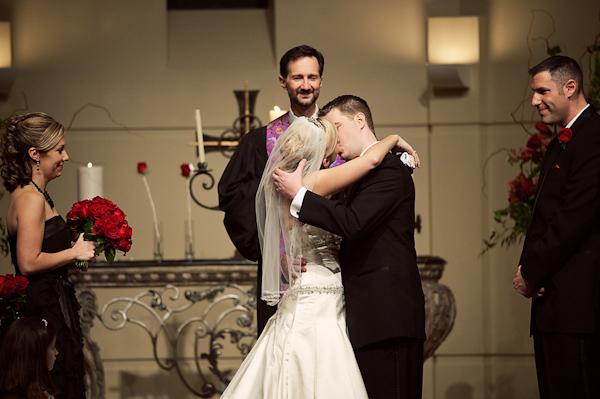 the bride and groom's ceremony kiss -  photo by Houston based wedding photographer Adam Nyholt 